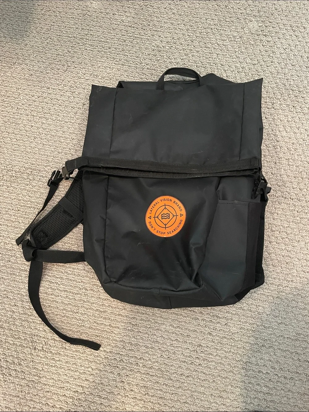 Lateral visión brand Black  Roll-Top Men's Backpack with Orange Logo